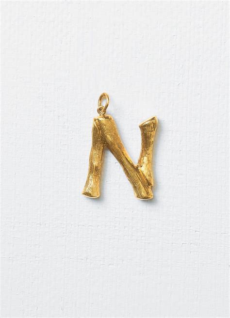 Alphabet N pendant in brass 